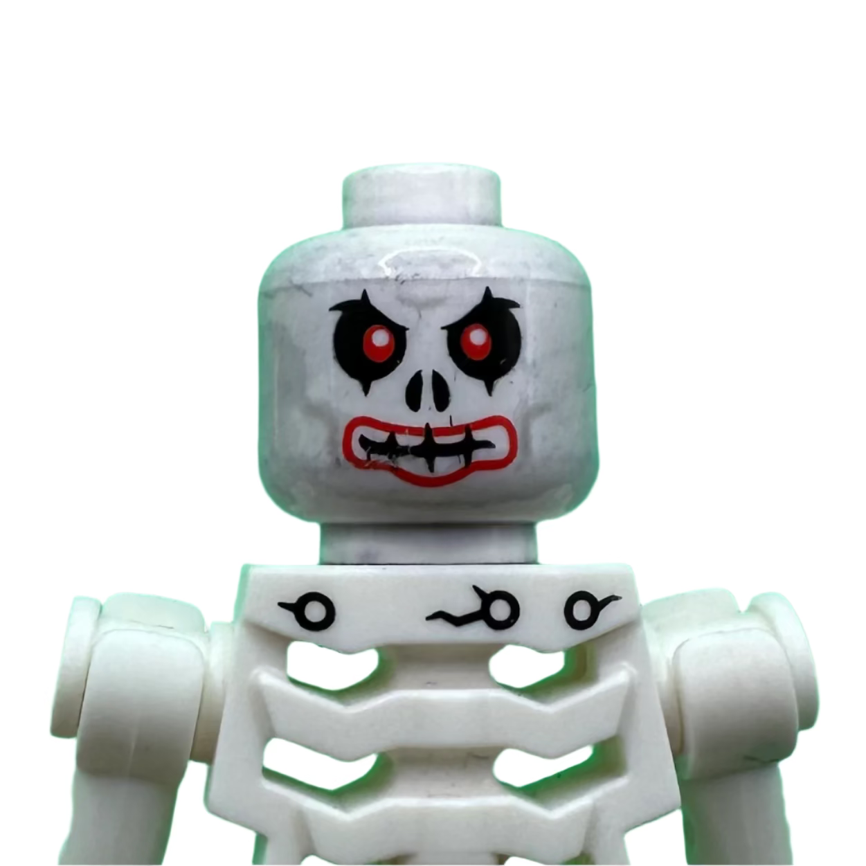 White skeleton Lego figure with red eyes