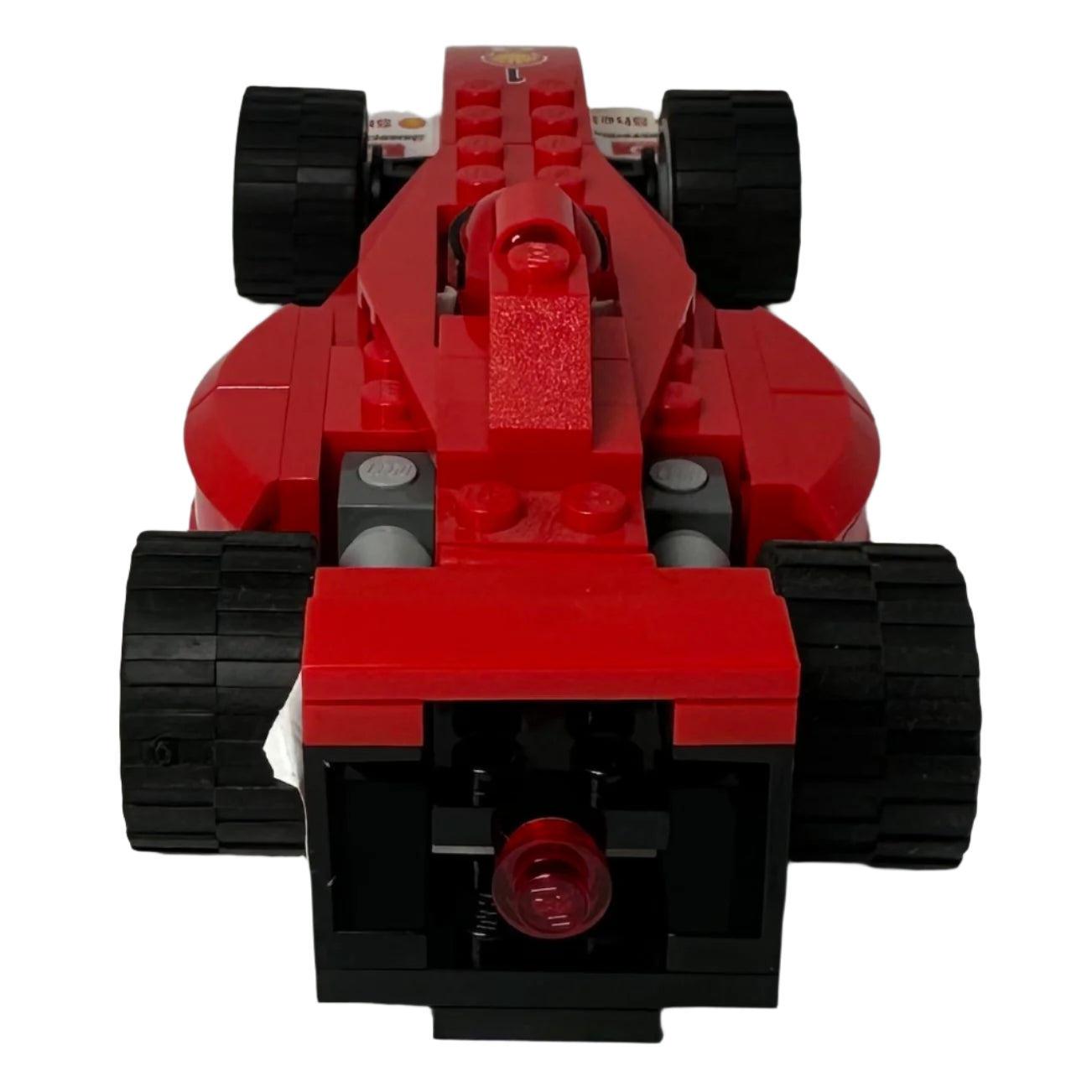 Red and black toy car made of Lego bricks