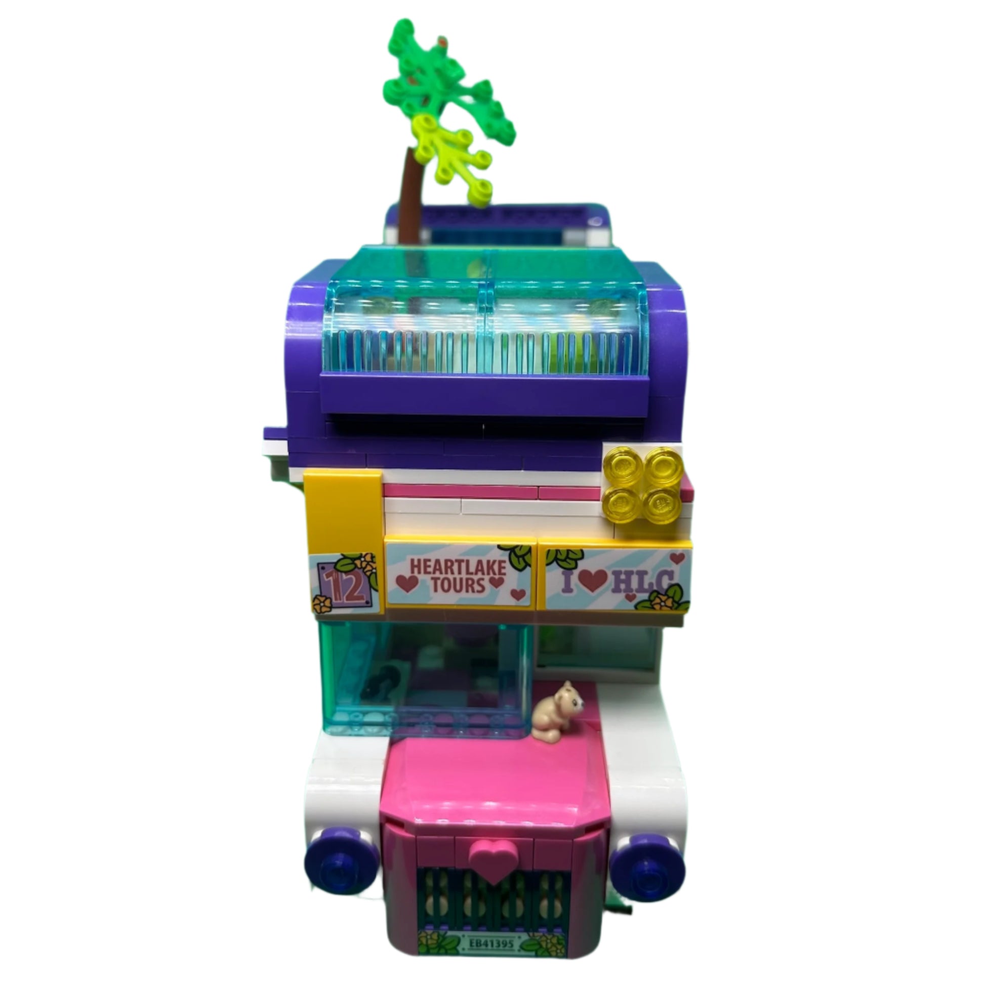 Colourful toy vehicle with a tree on top