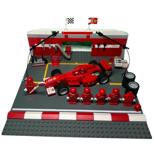 LEGO set with a red racing car and garage