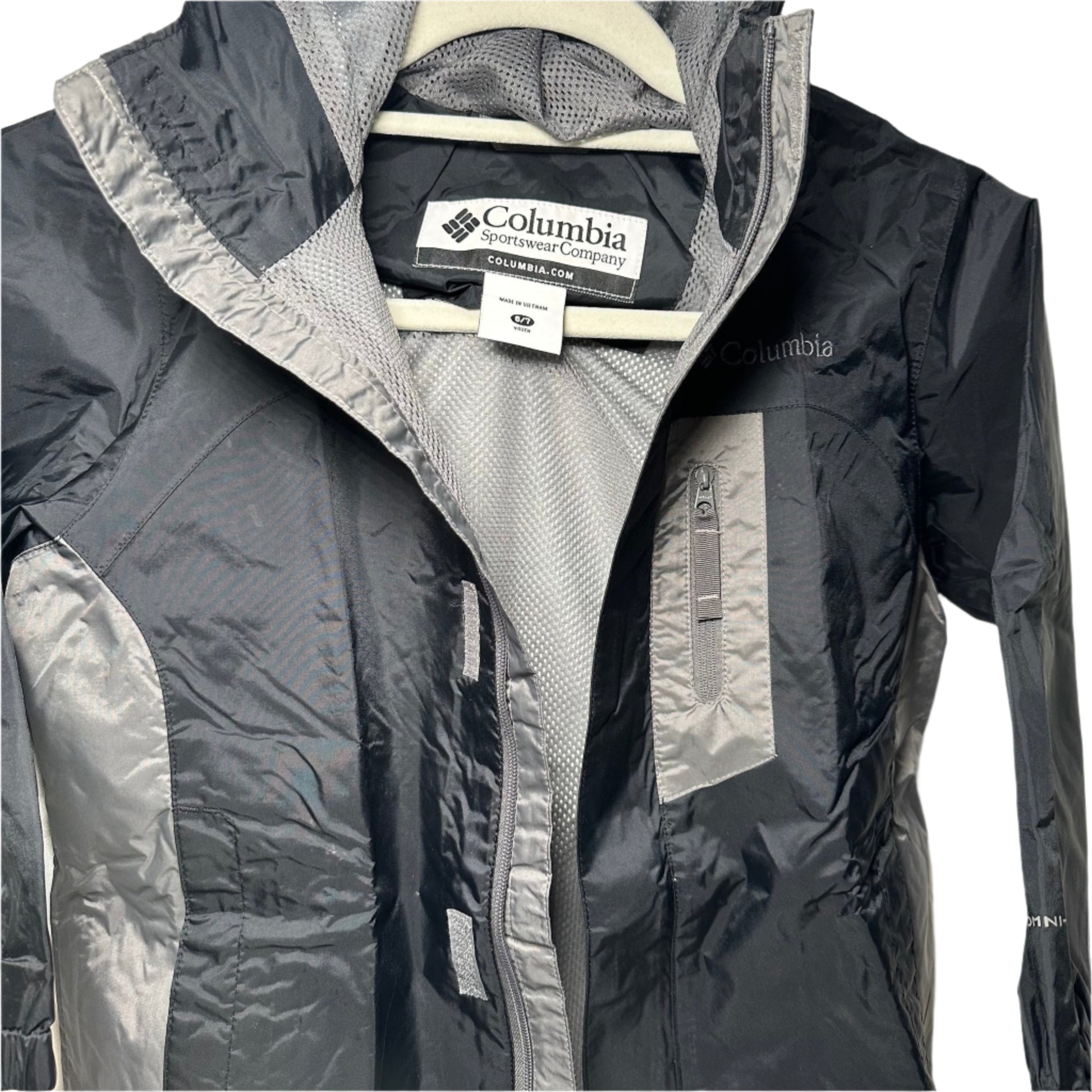 Black and gray Columbia jacket on a white background