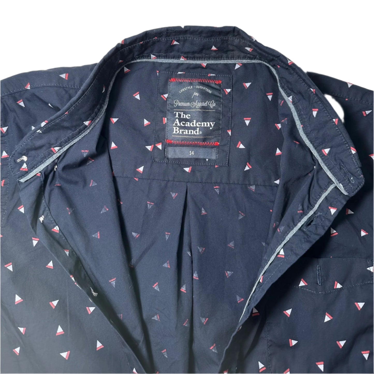 Navy jacket with small triangle pattern and 'The Academy Brand' label