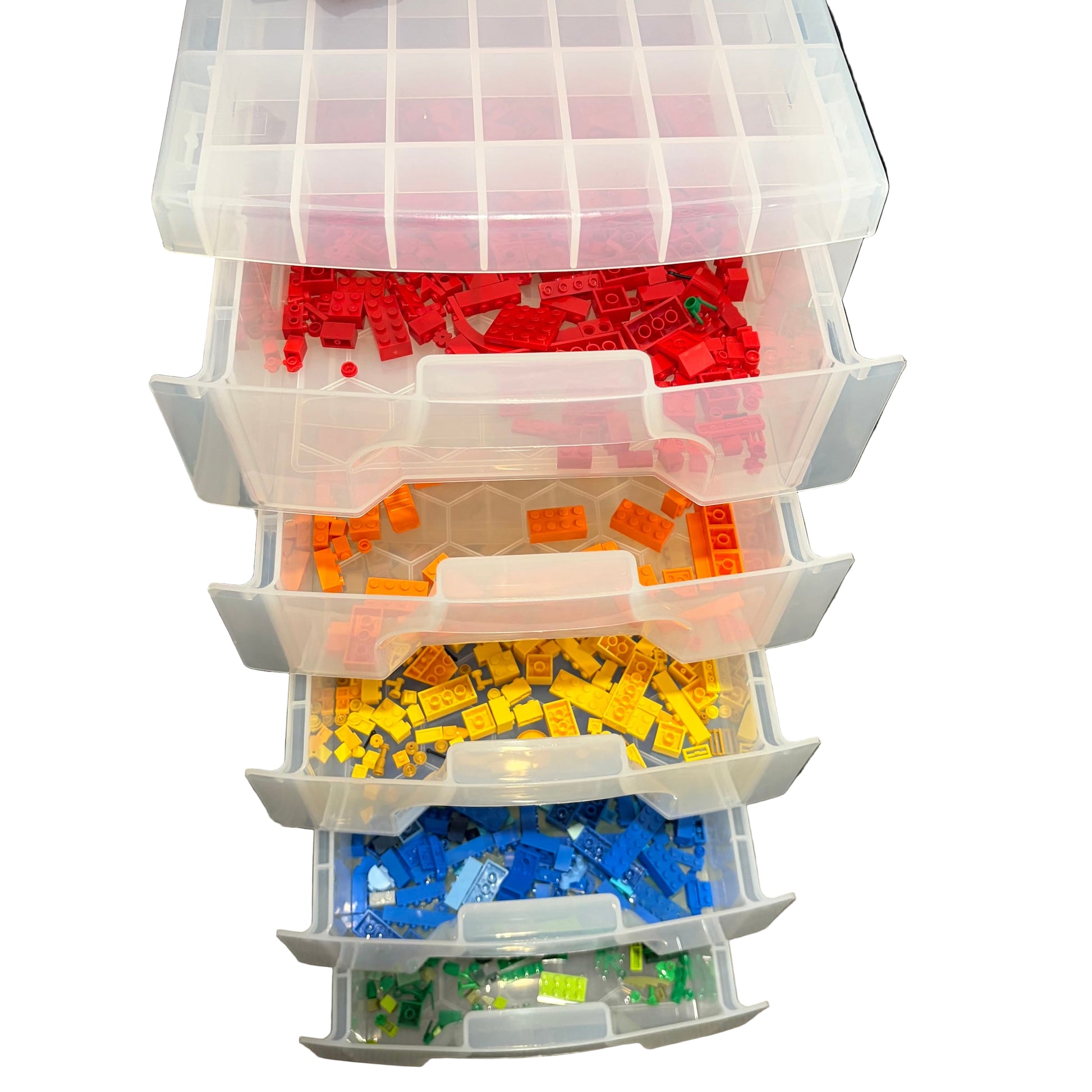 Stack of clear plastic drawers with colorful building blocks inside